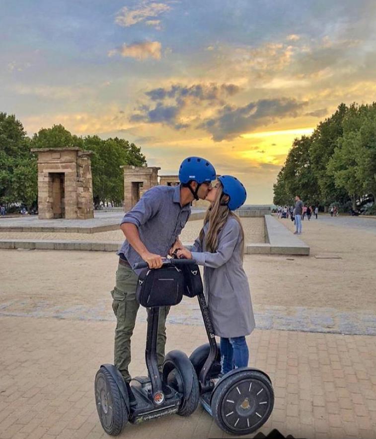a man riding on the back of a motorcycle